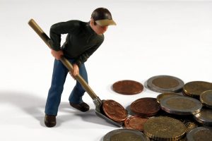 Man Shoveling Money
